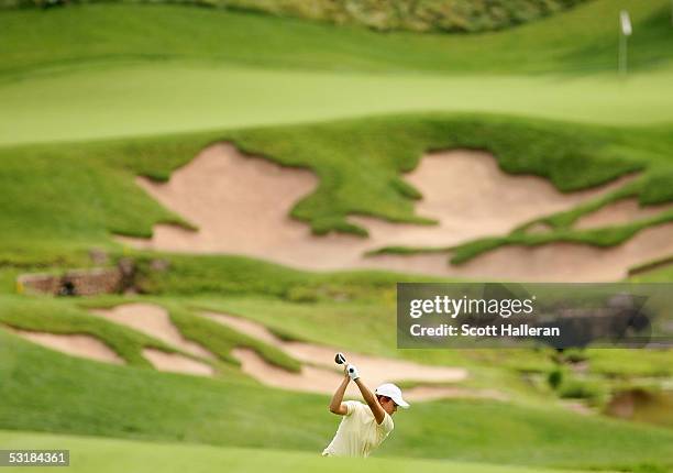 Sophie Gustafson of Sweden hits her second shot on the ninth hole during her match with Ai Miyazato of Japan during the third round of the HSBC World...