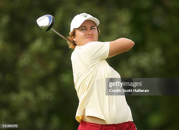 Sophie Gustafson of Sweden watches her tee shot on the ninth hole during her match with Ai Miyazato of Japan during the third round of the HSBC World...