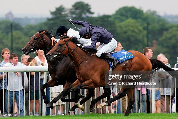 Kieren Fallon on Oratorio on his way to victory, goes past Johnny Murtagh on Motivator during The Coral-Eclipse Stakes at Sandown Racecourse on July...