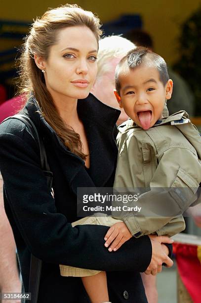 Angelina Jolie and son Maddox during Live 8, Africa Calling, hosted by musician Peter Gabriel, at The Eden Project on July 2, 2005 in St. Austell,...