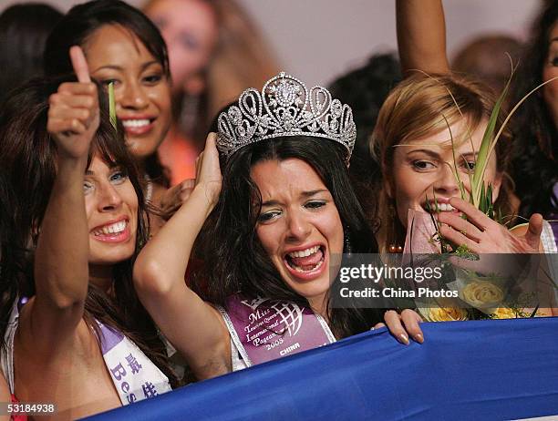 Nikoletta Ralli from Greece reacts after she won the Miss Tourism Queen International 2005 World Final on July 2, 2005 in Hangzhou of Zhejiang,...