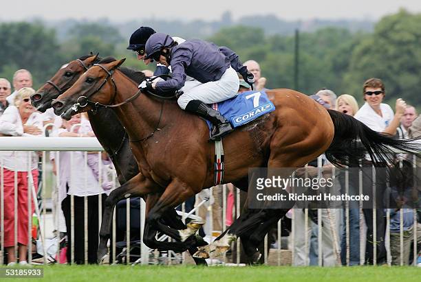 Kieren Fallon on Oratorio on his way to victory, goes past Johnny Murtagh on Motivator during The Coral-Eclipse Stakes at Sandown Racecourse on July...