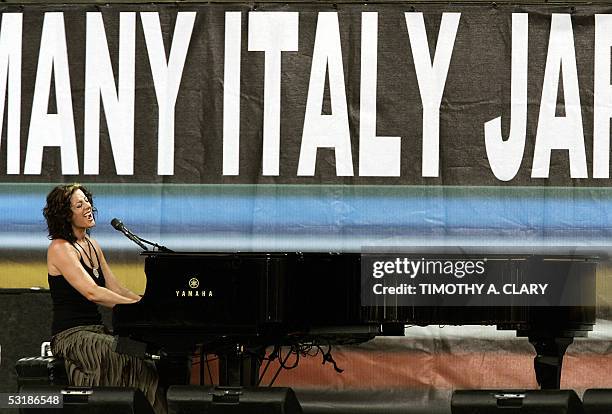 Philadelphia, UNITED STATES: Canadian musician Sarah McLachlan performs during the Live 8 concert 02 July 2005 at the Philadelphia Museum of Art in...