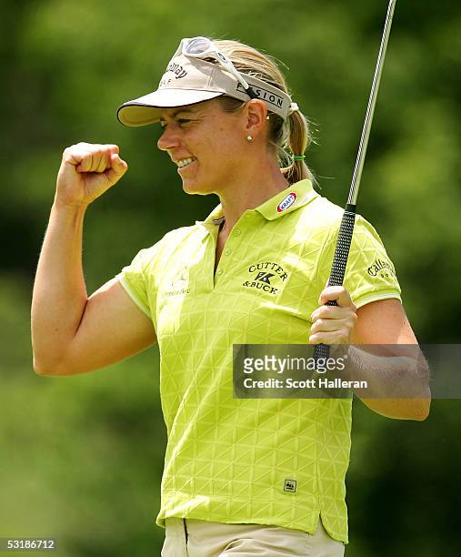 Annika Sorenstam of Sweden celebrates a birdie putt on the fifth green during her match with Candie Kung during the quarter-finals of the HSBC World...
