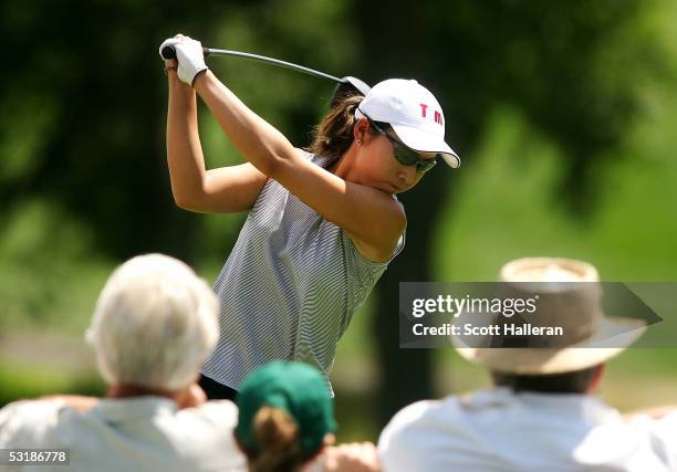 Candie Kung hits her tee shot on the tenth hole during her match with Annika Sorenstam of Sweden during the quarter-finals of the HSBC World Match...