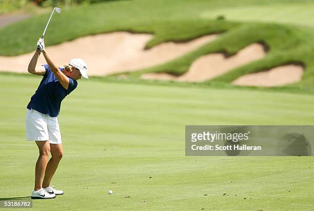 Wendy Ward hits her approach shot on the tenth hole during her match with Sophie Gustafson of Sweden during the quarter-finals of the HSBC World...