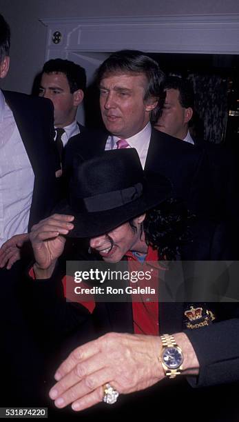 Donald Trump and Michael Jackson attend Trump Taj Mahal Grand Opening on April 6, 1990 in Atlantic City, New Jersey.