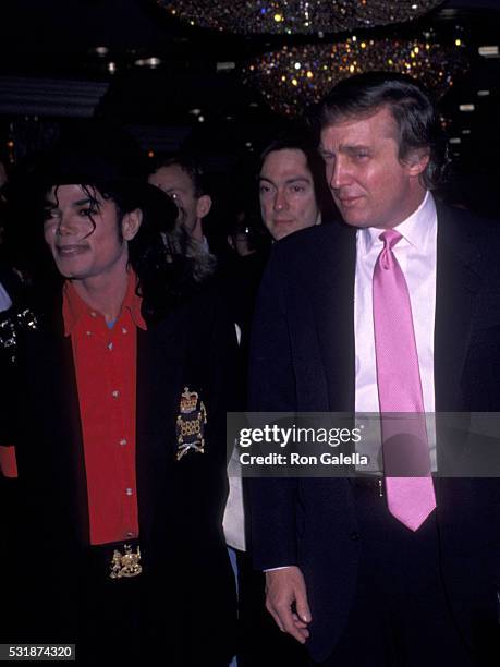 Donald Trump and Michael Jackson attend Trump Taj Mahal Grand Opening on April 6, 1990 in Atlantic City, New Jersey.