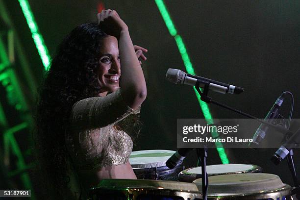 Israeli singer Noa performs on stage during "Live 8 Rome" at Circus Maximus on July 2, 2005 in Rome, Italy. The free concert is one of ten...