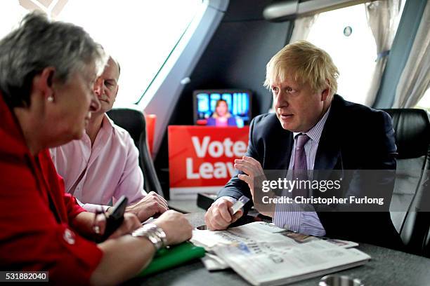 Boris Johnson MP, Labour MP Gisela Stuart and UKIP MP Douglas Carswell have a meeting on board the Vote Leave, Brexit Battle Bus on May 17, 20016 in...