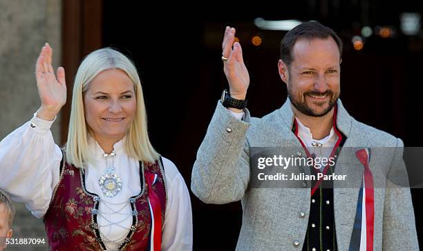 Crown Prince Haakon, and Crown Princess Mette-Marit of Norway, attend the traditional morning children's parade, at their home, Skaugum, in Asker,...