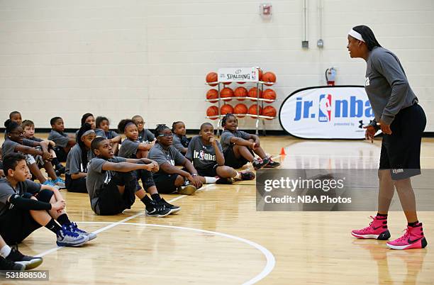 Former WNBA player Andrea Stinson talks to kids during a Jr. NBA youth clinic at the Quest Multisport gym on May 14, 2016 in Chicago, Illinois. NOTE...