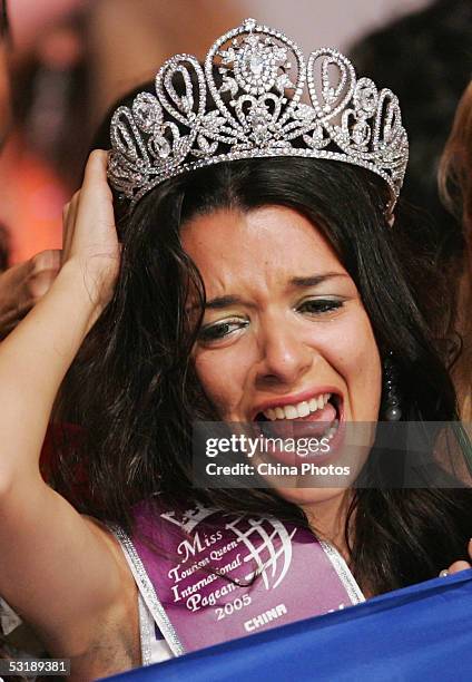 Nikoletta Ralli from Greece reacts after she won the Miss Tourism Queen International 2005 World Final on July 2, 2005 in Hangzhou of Zhejiang,...