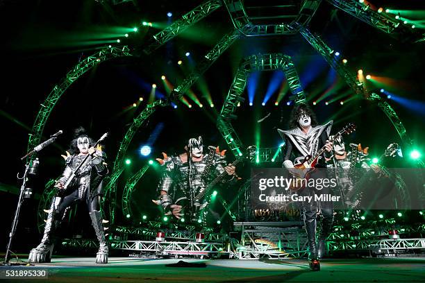 Gene Simmons, Eric Singer and Tommy Thayer of KISS perform in concert at the Austin360 Amphitheater on July 12, 2014 in Austin, Texas