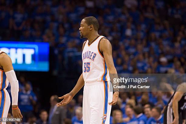 Kevin Durant of the Oklahoma City Thunder reacts after fouling a San Antonio Spurs player during Game Six of the Western Conference Semifinals during...
