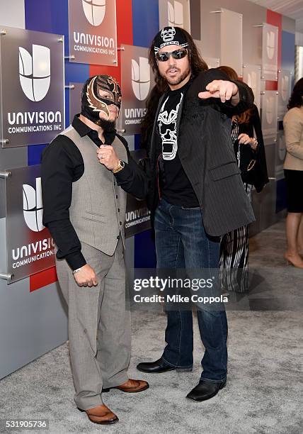 Professional wrestlers Rey Mysterio and Johnny Mundo attend Univision's 2016 Upfront Red Carpet at Gotham Hall on May 17, 2016 in New York City.