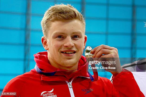 Adam Peaty of Great Britain poses with his Gold medal after winning the Men's 100m Breastroke Final on day nine of the 33rd LEN European Swimming...