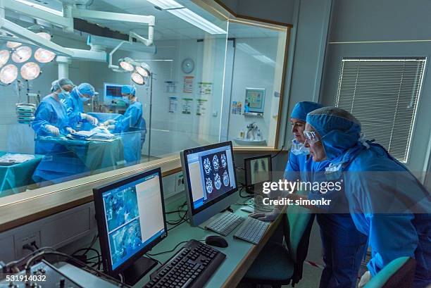 Doctor Controls 51 Control Room Monitors Mask Stock Photos, High-Res Pictures, and ...