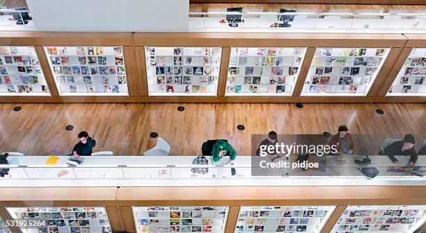 inside the public library of amsterdam - literature student stock pictures, royalty-free photos & images