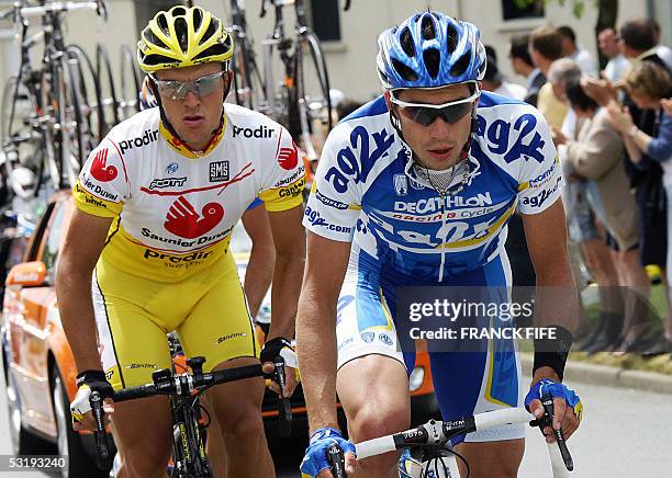 La Chataigneraie, France: Frenchman Nicolas Portal rides in front of Spaniard David Canada during their breakaway in the 92nd Tour de France cycling...