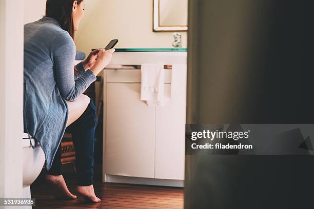 non stop texting - urinating stock pictures, royalty-free photos & images