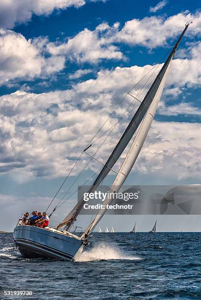 saiboat racing at regatta, front view - sailing club stock pictures, royalty-free photos & images