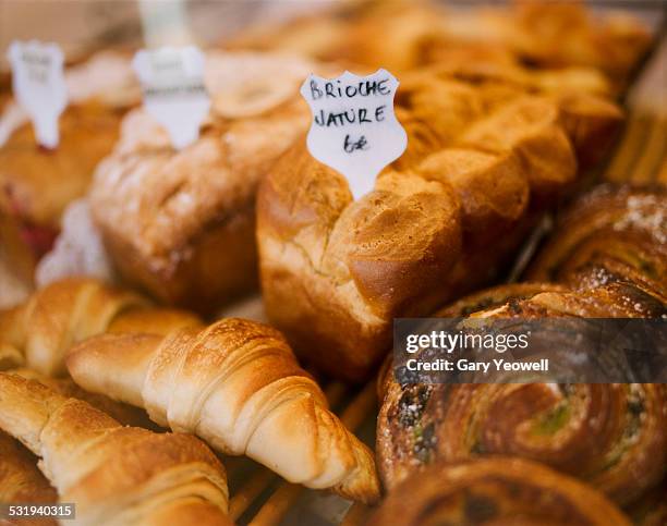 various bread and cakes in a patisserie - lyon shopping stock pictures, royalty-free photos & images