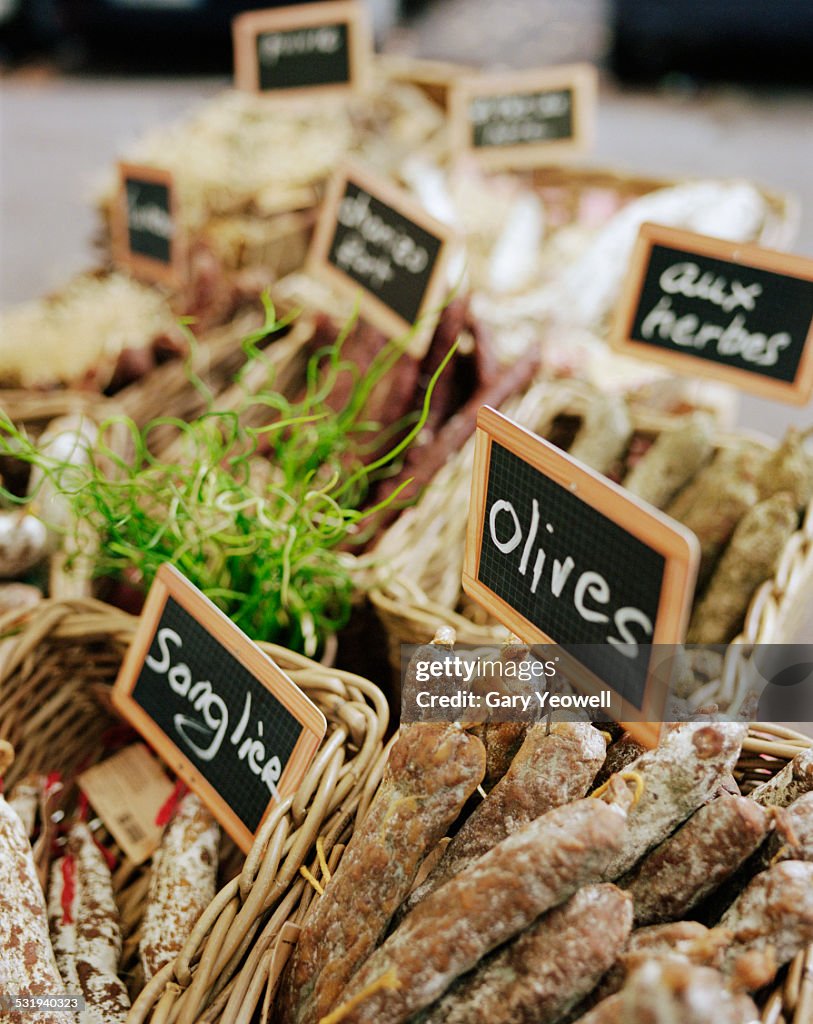 Variety of sausages displayed on a Lyon market