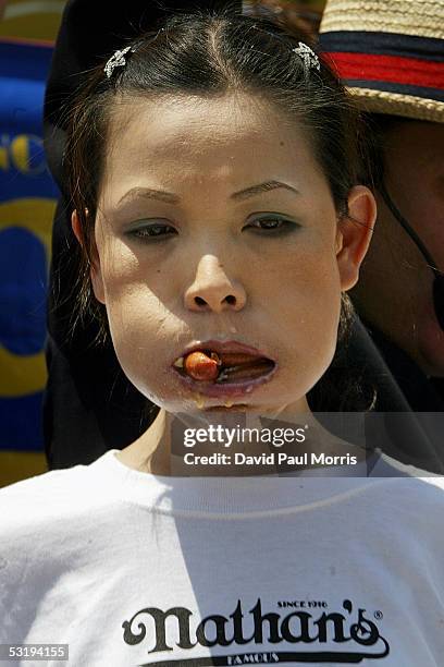 Sonya Thomas competes with 14 other people from around the world in the annual Fourth of July International Hot Dog Eating Contest at Nathans Famous...