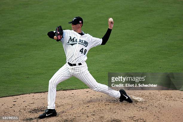 Pitcher Scott Olsen of the Florida Marlins delivers a pitch against the Milwaukee Brewers on July 4, 2005 at Dolphins Stadium in Miami, Florida.