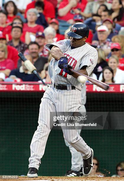 Jacque Jones of the Minnesota Twins hits a one run double against the Los Angeles Angels of Anaheim on July 4, 2005 at Angel Stadium in Anaheim,...