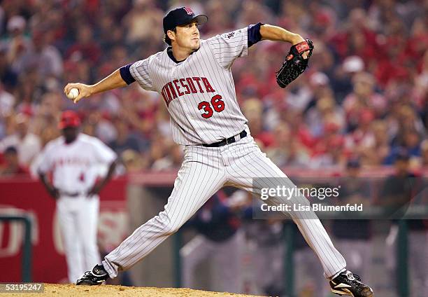 Joe Nathan of the Minnesota Twins pitches in the 9th inning against the Los Angeles Angels of Anaheim on July 4, 2005 at Angel Stadium in Anaheim,...