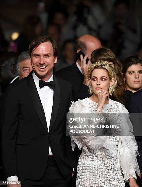 German actor Lars Eidinger and US actress Kristen Stewart pose as they arrive on May 17, 2016 for the screening of the film "Personal Shopper" at the...