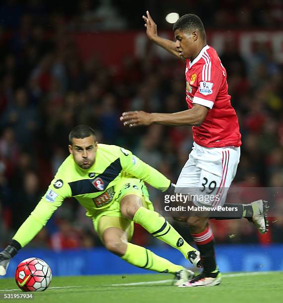 Marcus Rashford of Manchester United in action with Adam Federici of AFC Bournemouth during the Barclays Premier League match between Manchester...