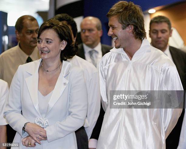 Cherie Blair, wife of British Prime Minister Tony Blair, arrives with London 2012 bid ambassador England's football star David Beckham at the Sports...