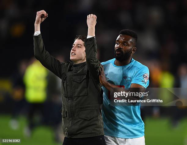 Young Hull City fan finds himself in the way of Darren Bent of Derby County during the Sky Bet Championship Play Off semi final second leg match...