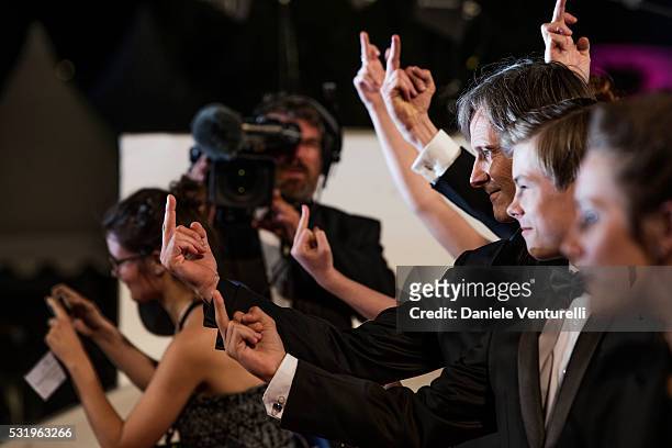 Viggo Mortensen poses as he arrives screening of the film "Captain Fantastic" ahead of the "Personal Shopper" premiere during the 69th annual Cannes...
