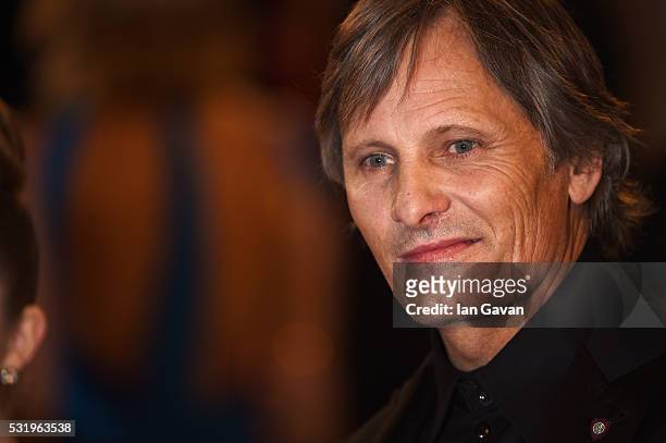 Actor Viggo Mortensen poses as he arrives for the screening of the film "Captain Fantastic" ahead of the "Personal Shopper" premiere during the 69th...