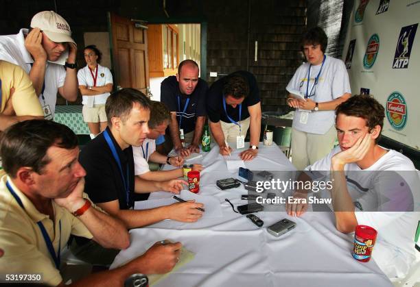 Andrew Murray of Great Britian talks to the media following his match against Gregory Carraz of France on July 5, 2005 in the first round of the...