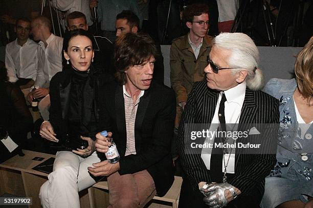 Wren Scott, Mick Jagger and Karl Lagerfeld attend the Dior's Men fashion Show,designed by Heidi Slimane,on July 1st, 2005 in Paris, France.