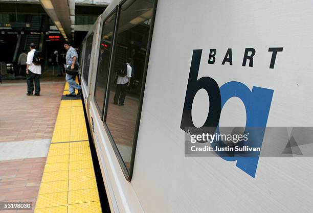 Commuters walk off of a Bay Area Rapid Transit train July 5, 2005 in San Francisco, California. With a strike deadline looming at the end of the July...