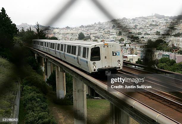 Bay Area Rapid Transit train is seen through a fence July 5, 2005 in San Francisco, California. With a strike deadline looming at the end of the July...