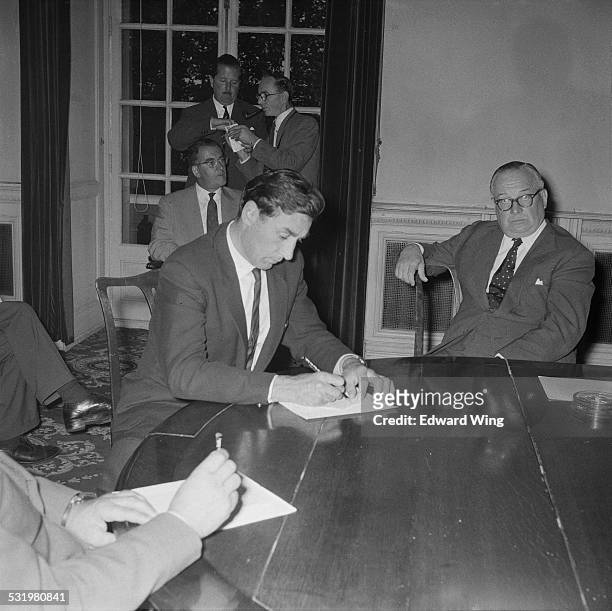 British motor racing driver and manager Roy Salvadori at a RAC meeting in Pall Mall, London, 28th August 1958.