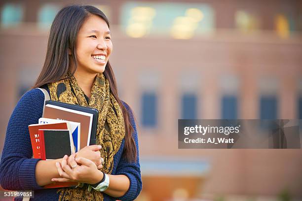 she sees a bright futrure ahead - school book stock pictures, royalty-free photos & images