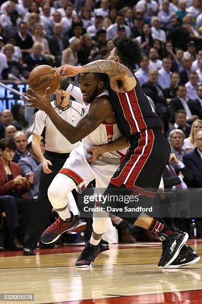 DeMarre Carroll of the Toronto Raptors handles the ball in Game Five of the Eastern Conference Semifinals between the Miami Heat and Toronto Raptors...