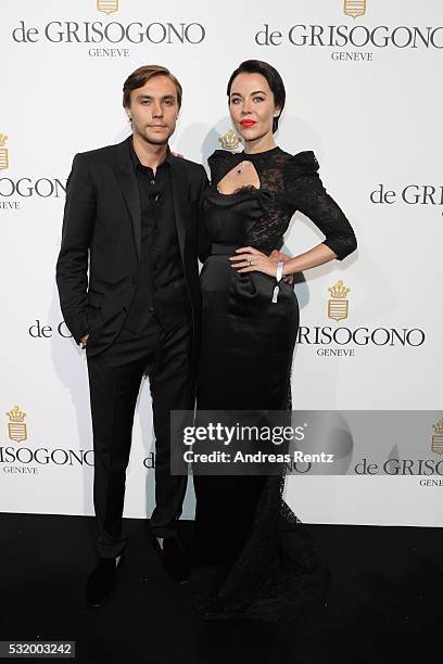 Ulyana Sergeenko and guest attends the De Grisogono Party during the annual 69th Cannes Film Festival at Hotel du Cap-Eden-Roc on May 17, 2016 in Cap...