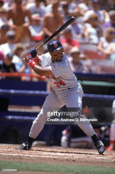 Kirby Puckett of the Minnesota Twins stands ready at the plate during a game against the California Angels at Anaheim Stadium on July 1, 1992 in...