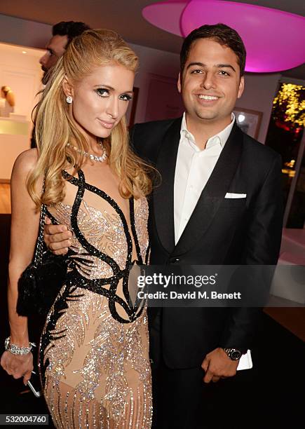 Paris Hilton and Jamie Reuben attend the de Grisogono party during the 69th Cannes Film Festival at Hotel du Cap-Eden-Roc on May 17, 2016 in Cap...