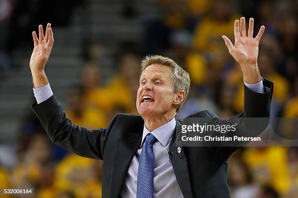 Head coach Steve Kerr of the Golden State Warriors reacts during game one of the NBA Western Conference Finals against the Oklahoma City Thunder at...