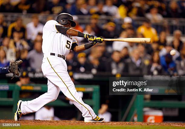 Alen Hanson of the Pittsburgh Pirates records his first Major League hit in the fifth inning during the game against the Atlanta Braves at PNC Park...